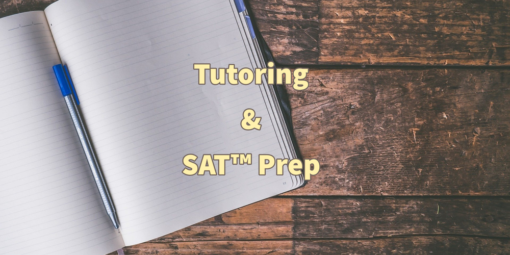 open notebook on hardwood with title Tutoring and SAT prep